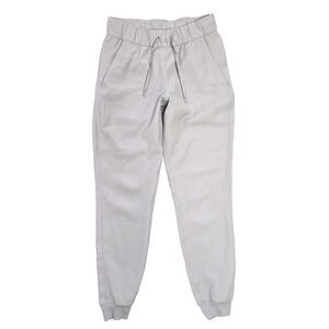 Lululemon On‎ The Fly Jogger Pants Womens 2 Light Gray Drawstring Pockets Cuffed